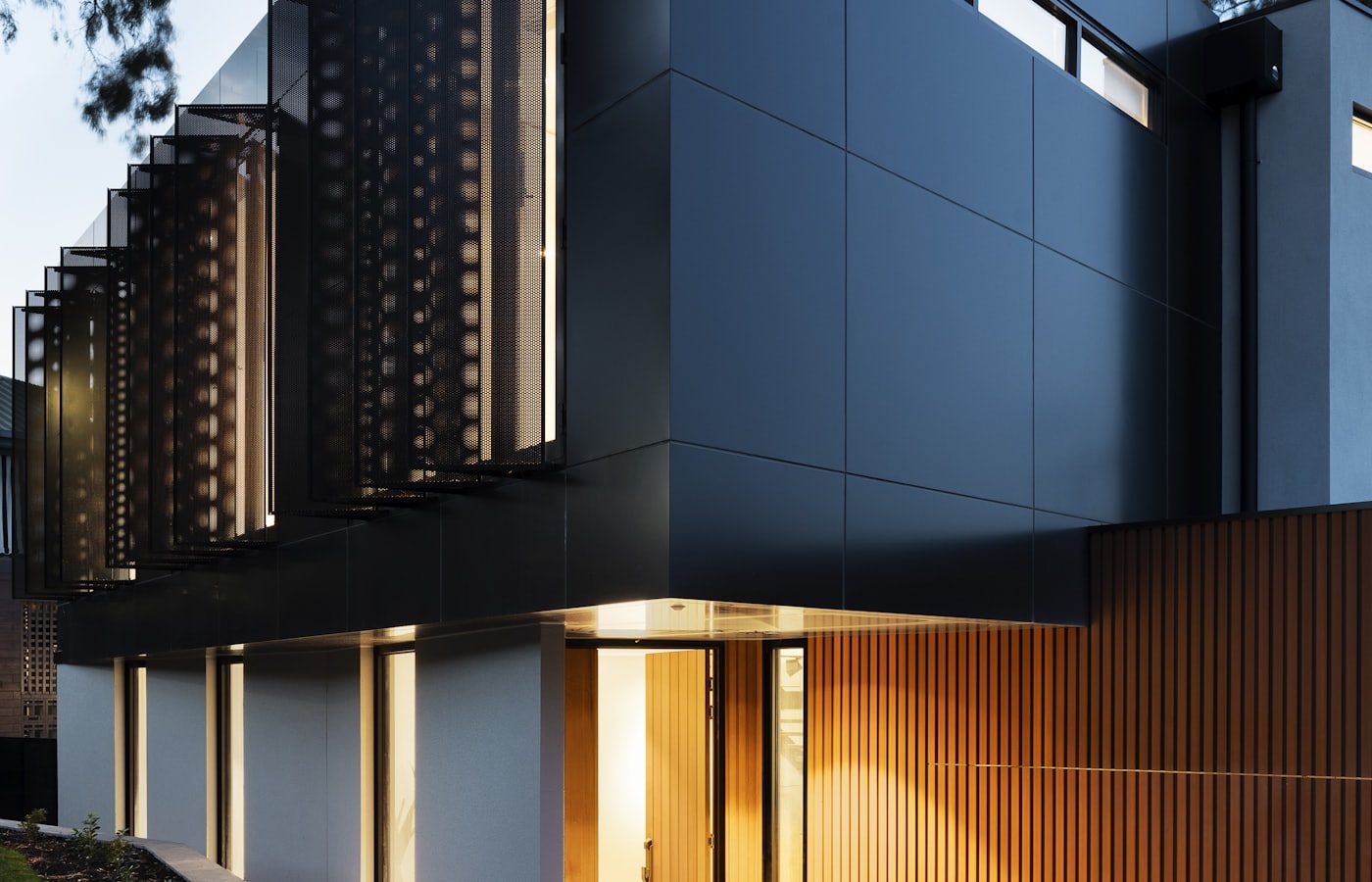 Modern commercial building exterior at dusk