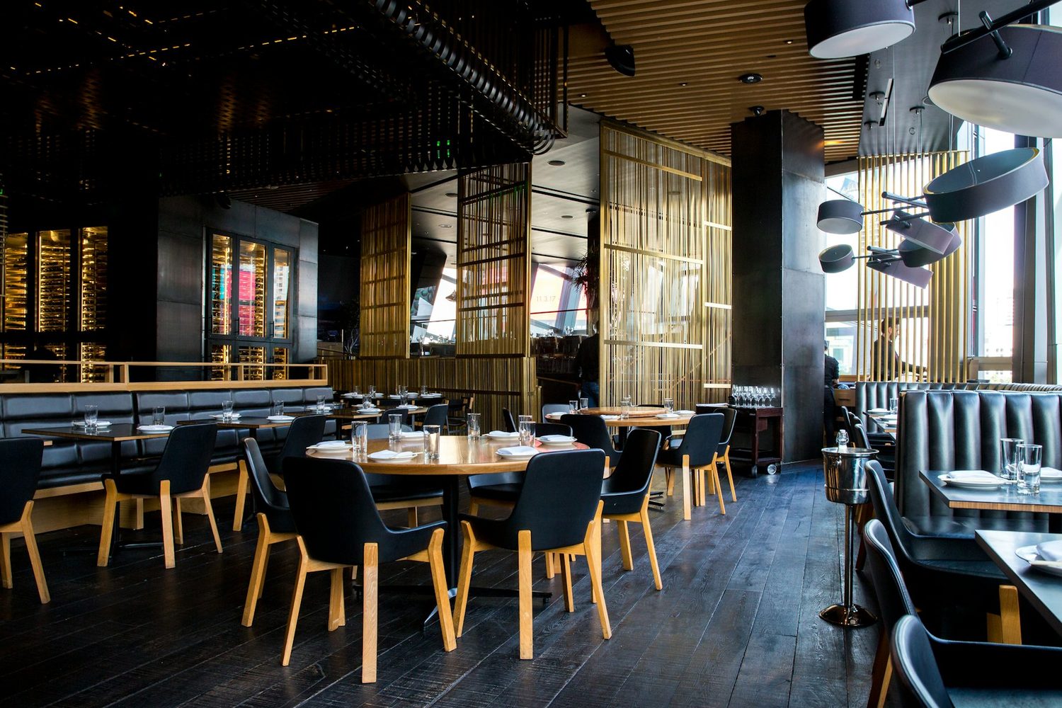 Restaurant interior with dining tables set for service